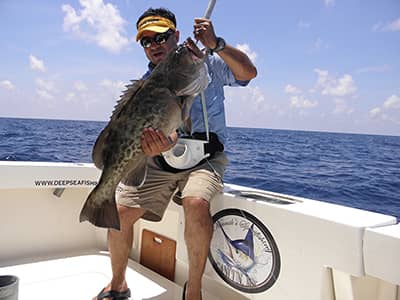 grouper fishig in cancun on board the sailfish run